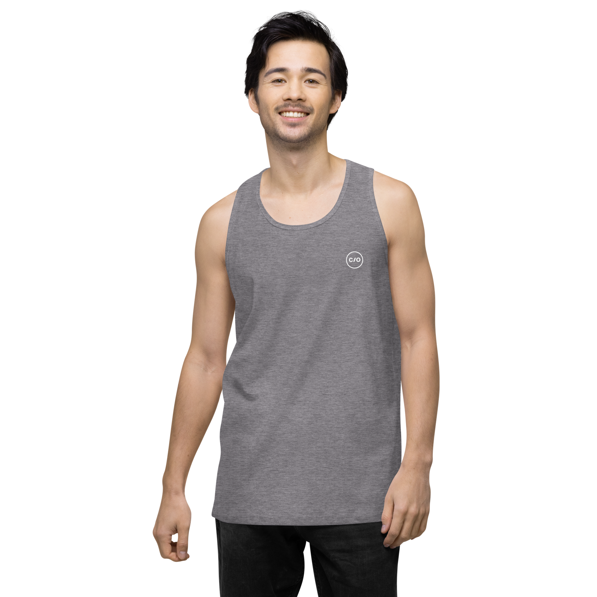 Man smiling and wearing Neue Supply Co. Essential Workout Tank Top for Men in Athletic Heather Gray
