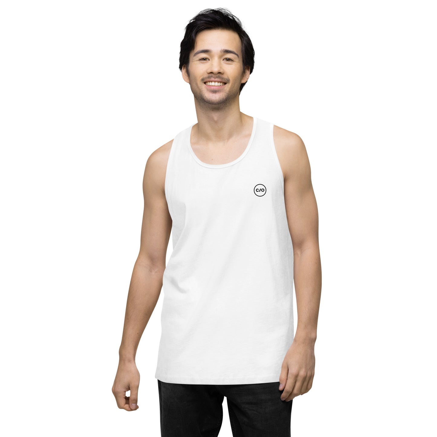 Man smiling and wearing Neue Supply Co. Essential Workout Tank Top for Men in White